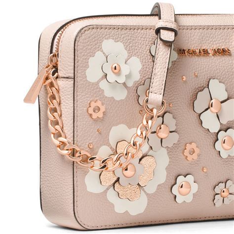 michael kors yellow flower crossbody bag|Michael Kors pink suitcase.